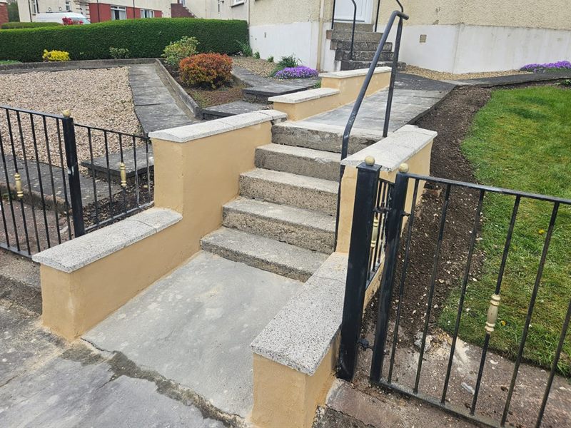Rendered front steps and walls with new copes and iron railings